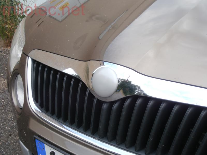 Kryt emblému přední, stříbrný matný - Škoda Octavia II. Facelift