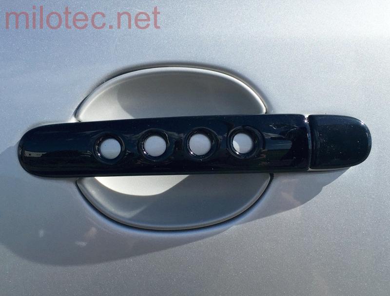 Kryty klik děrované, černý lesklý "klavírlak" (4+4ks dva zámky) - Škoda Octavia II. Facelift