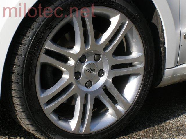 Kryt emblému Alu kola s vypískovaným M-logem - Škoda Octavia III.